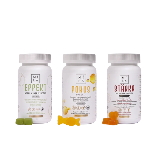 Three white supplement bottles from MILA arranged on a white background, with small gummy candies in green, yellow, and orange placed in front of each bottle. The bottles are labeled EPEKPT Apple Cider Vinegar, POKUS Omega-3, and ŽĀRA Probiotic Fermented Gummies.